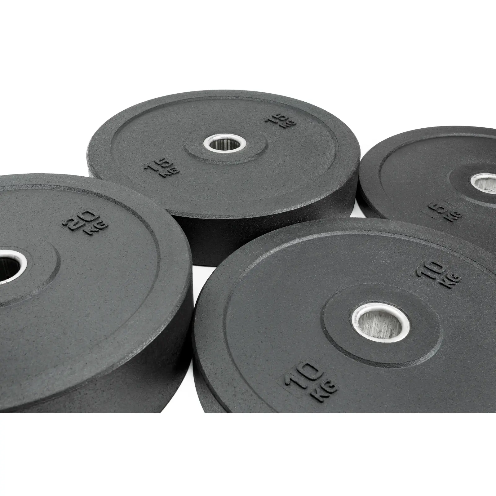 Obciążenia olimpijskie Bumper Essential położone obok siebie