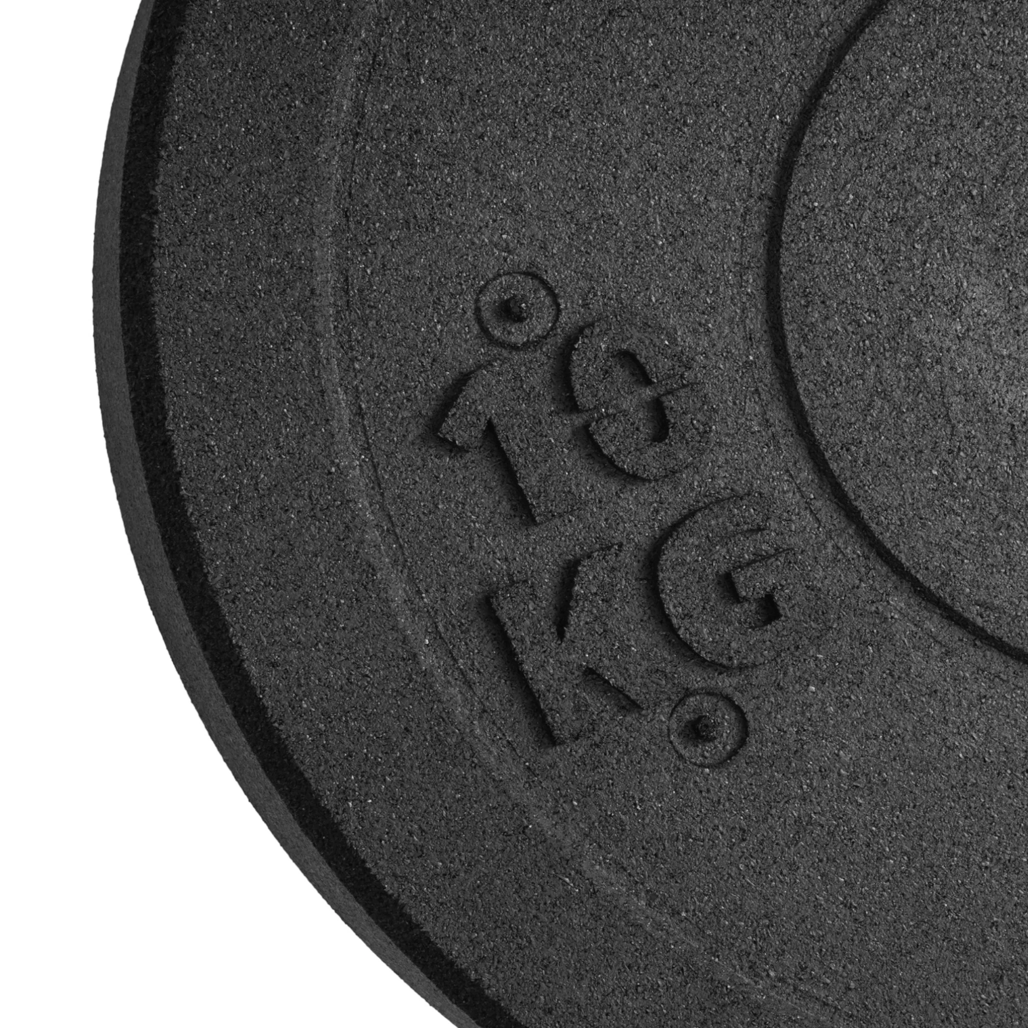 Oznaczenie wagi 10 kg i struktura granulatu gumowego na talerzu Bumper Essential, zbliżenie makro